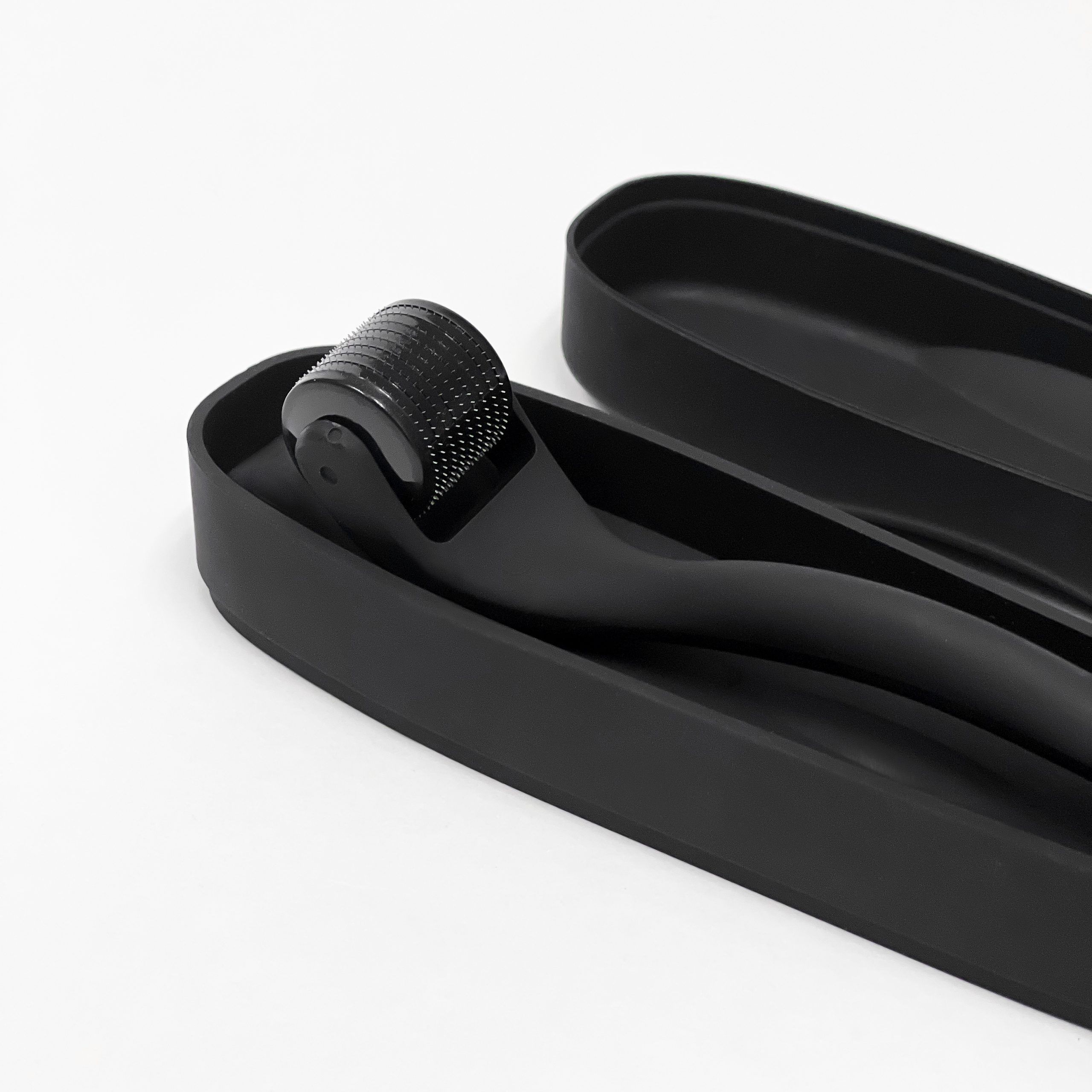 black microneedle roller in black case