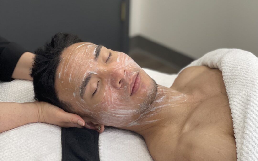 male model getting a facial