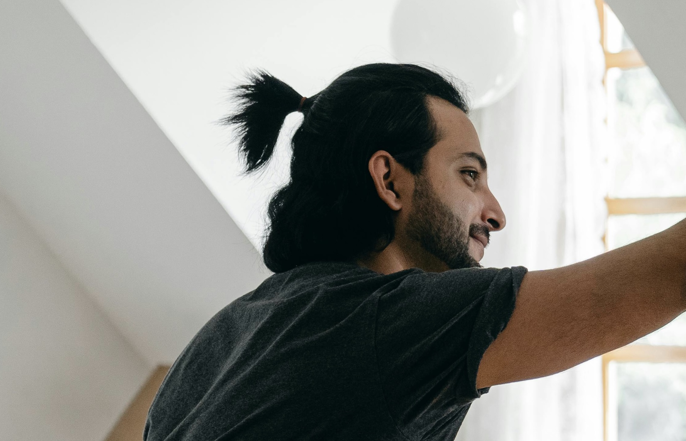 Beauty school student with hair tied back