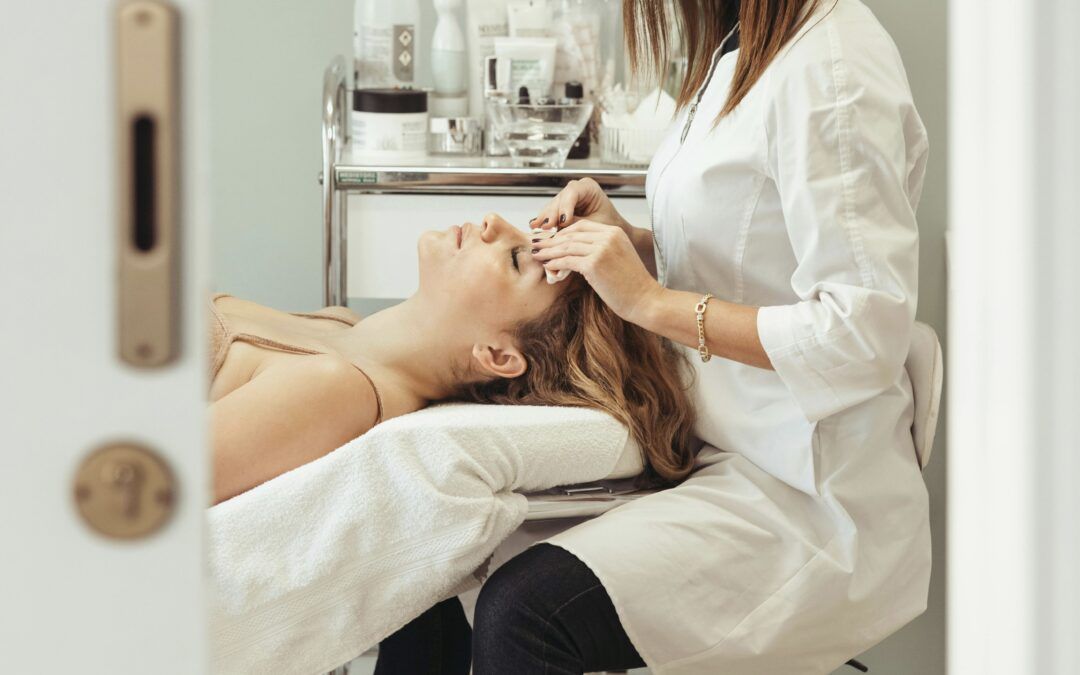 an esthetician performing a facial