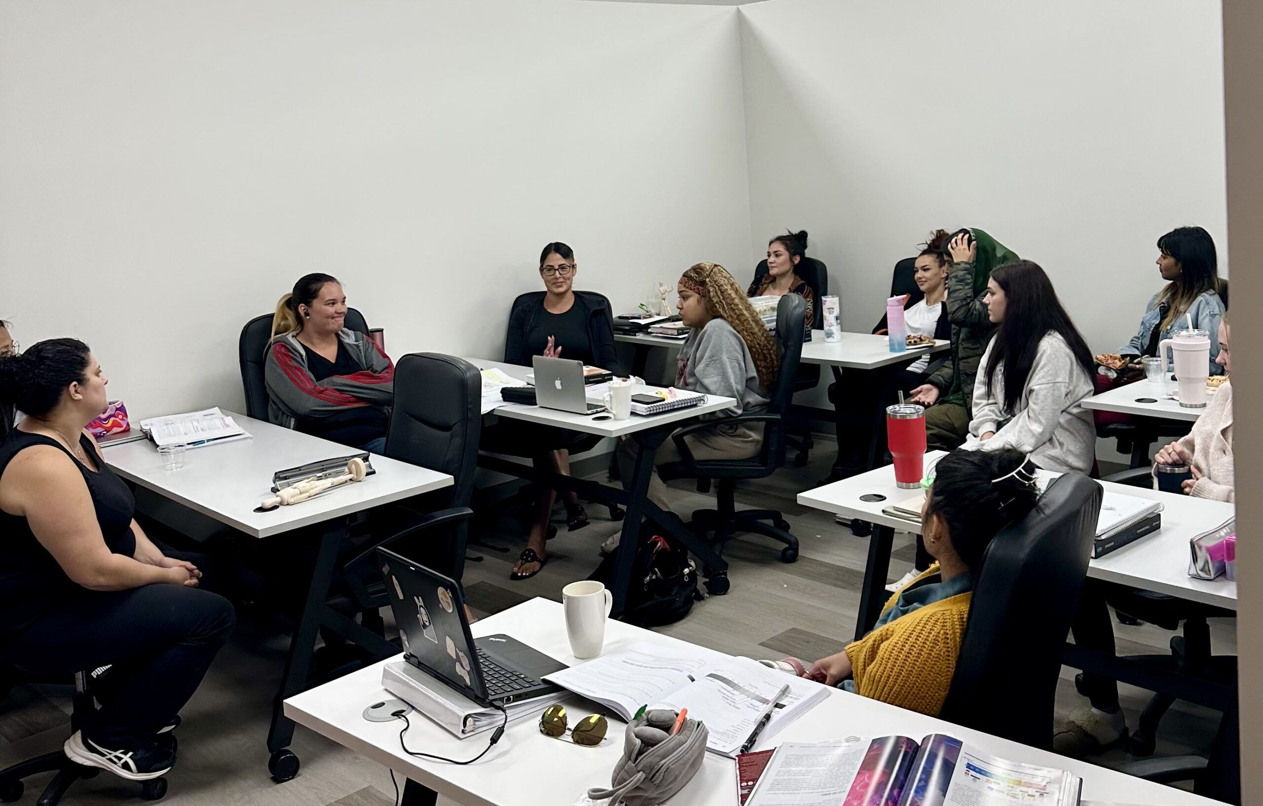 a classroom full of feature estheticians at Wrapture Beauty Academy