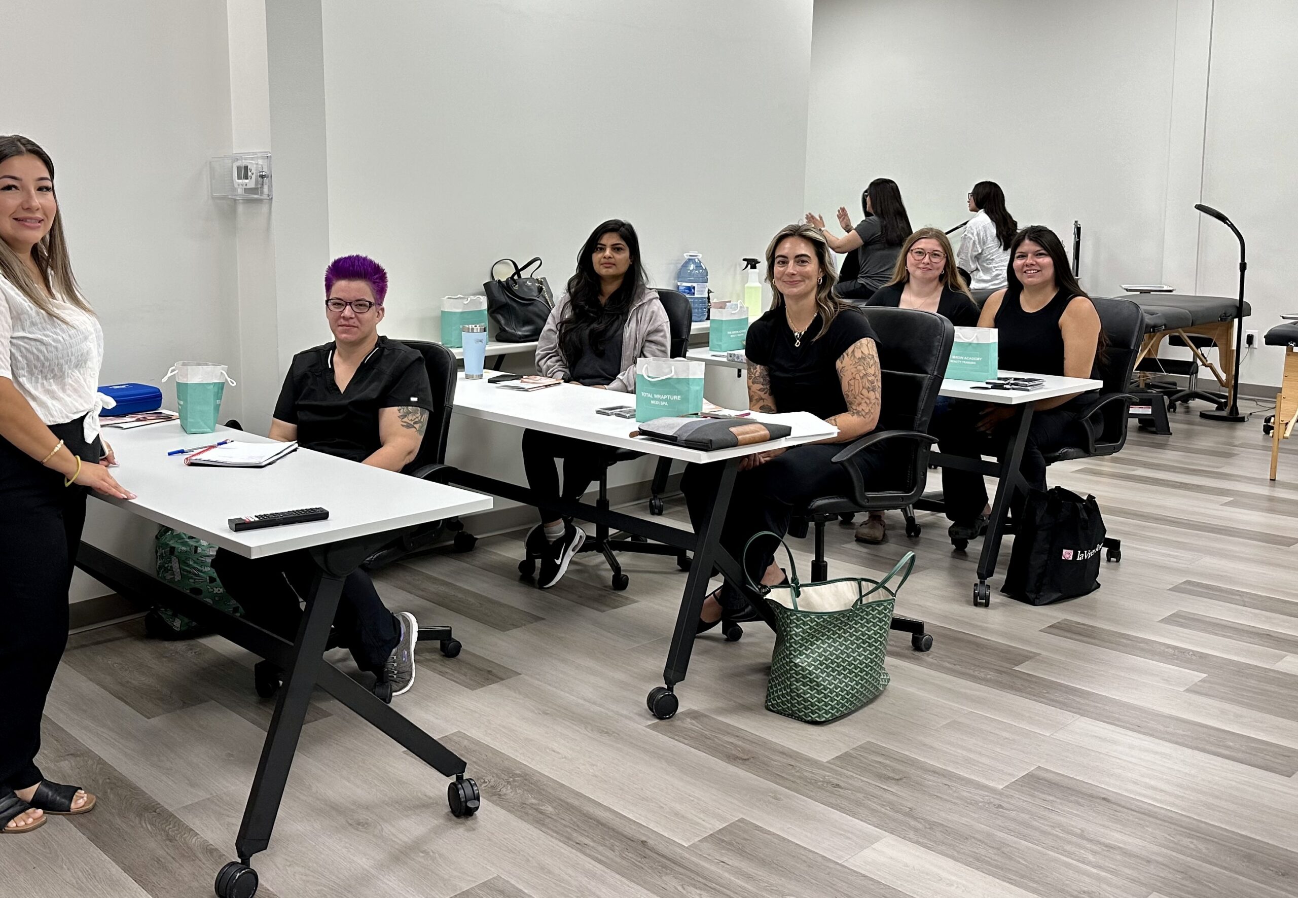 a classroom of beauty students at Wrapture Beauty Academy