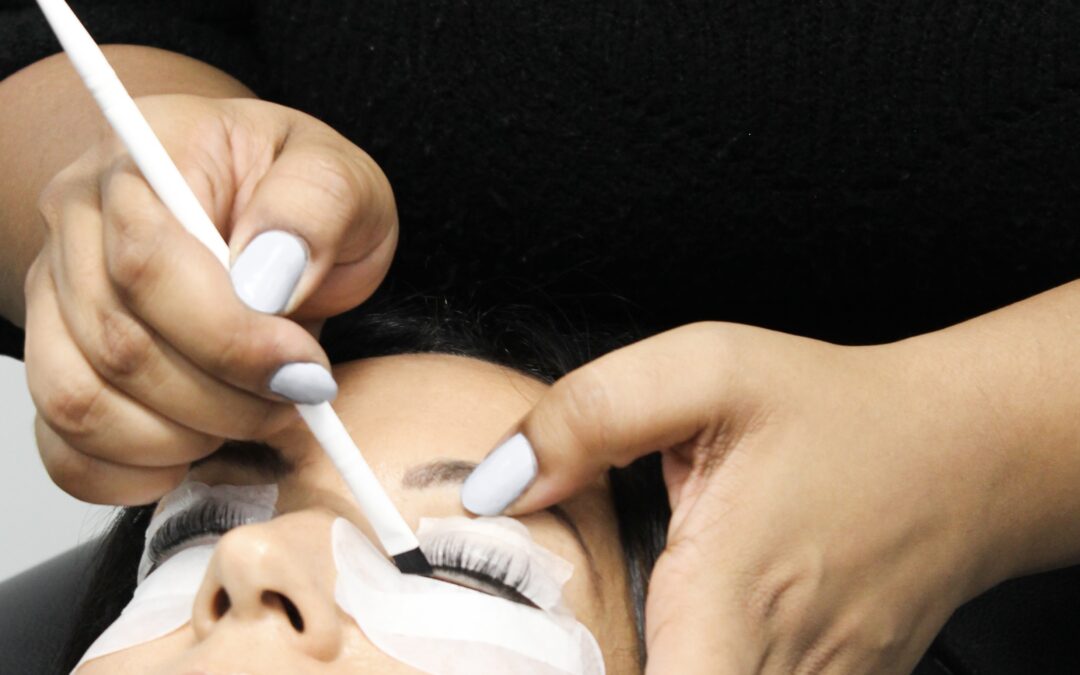 a student practicing a lash lift