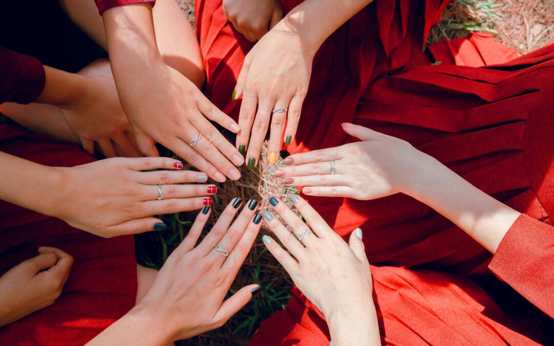 A lineup of models from the Nail Technician Program in Winnipeg shows off a variety of manicures—acrylics, shellac, and regular polish—all done by students in training. types of nails at the salon