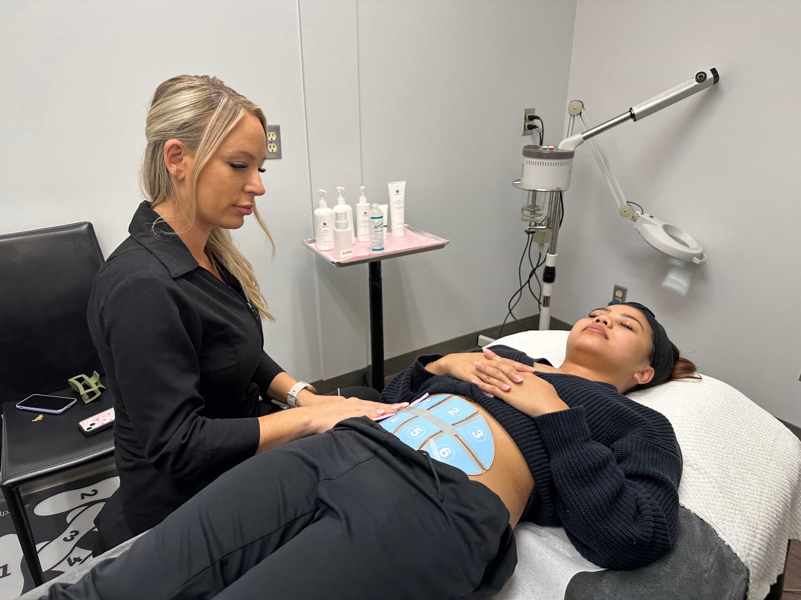 Body contouring treatment with RF technology, showing how skin tightening and firming services complement advanced laser training.
